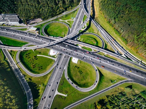 aerial-view-of-a-massive-highway-road-intersection-2022-02-01-23-40-22-utc