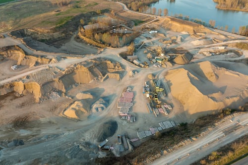 aerial-view-of-open-pit-mine-of-sandstone-material-2023-11-27-05-13-56-utc