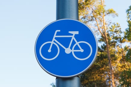 blue-bicycle-lane-sign-marking-bicycle-path-2021-10-26-07-57-27-utc