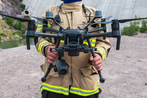 firefighter-operating-a-drone-in-search-and-rescue-2023-11-27-04-56-59-utc