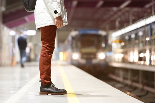 man-waiting-train-at-metro-station-2023-11-27-05-00-49-utc