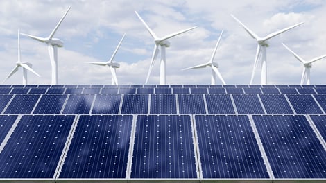 solar-panels-and-wind-turbine-on-the-sky-backgroun-2022-12-16-11-55-37-utc