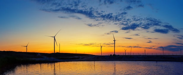 wind-generators-power-plant-on-lake-at-sunset-2021-08-30-17-16-44-utc