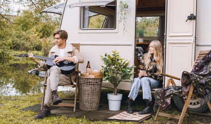 young-just-married-couple-traveling-in-camper-hous-2022-11-09-17-47-12-utc