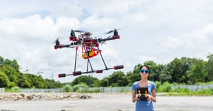 young-woman-fly-with-drone-2021-08-29-11-56-42-utc