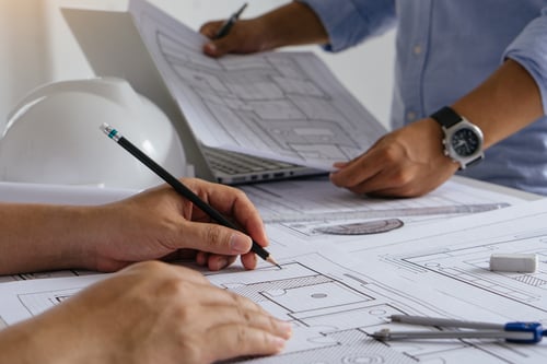 architects-working-together-team-of-architects-on-2023-02-14-22-09-53-utc