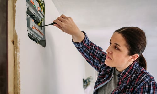 electrician-working-on-the-distribution-panel-of-a-2023-11-27-05-27-27-utc