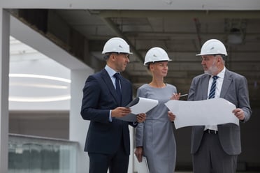 management-discussing-construction-on-site-2021-09-24-04-10-46-utc-1