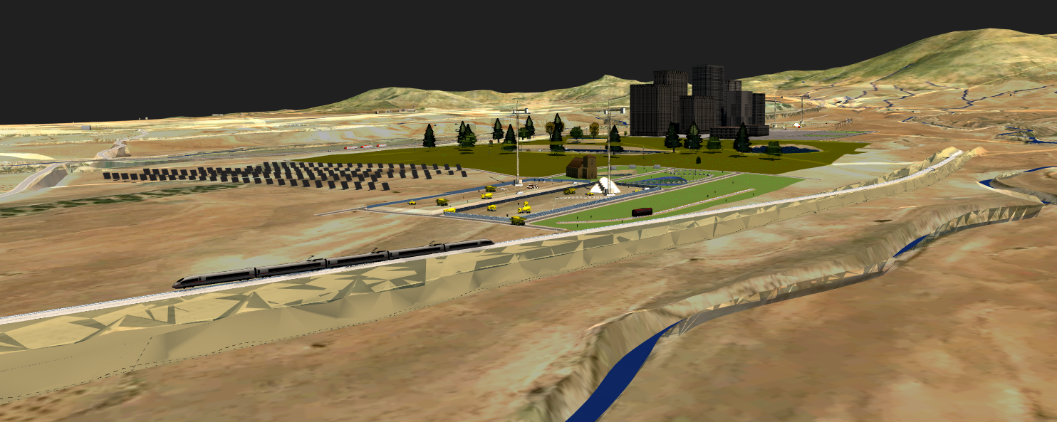 Figura 2. Ámbito de proyecto de la nueva urbanización. En primer plano, la línea de ferrocarril proyectada y al fondo, el libramiento carretero, todo modelado en Infraworks.