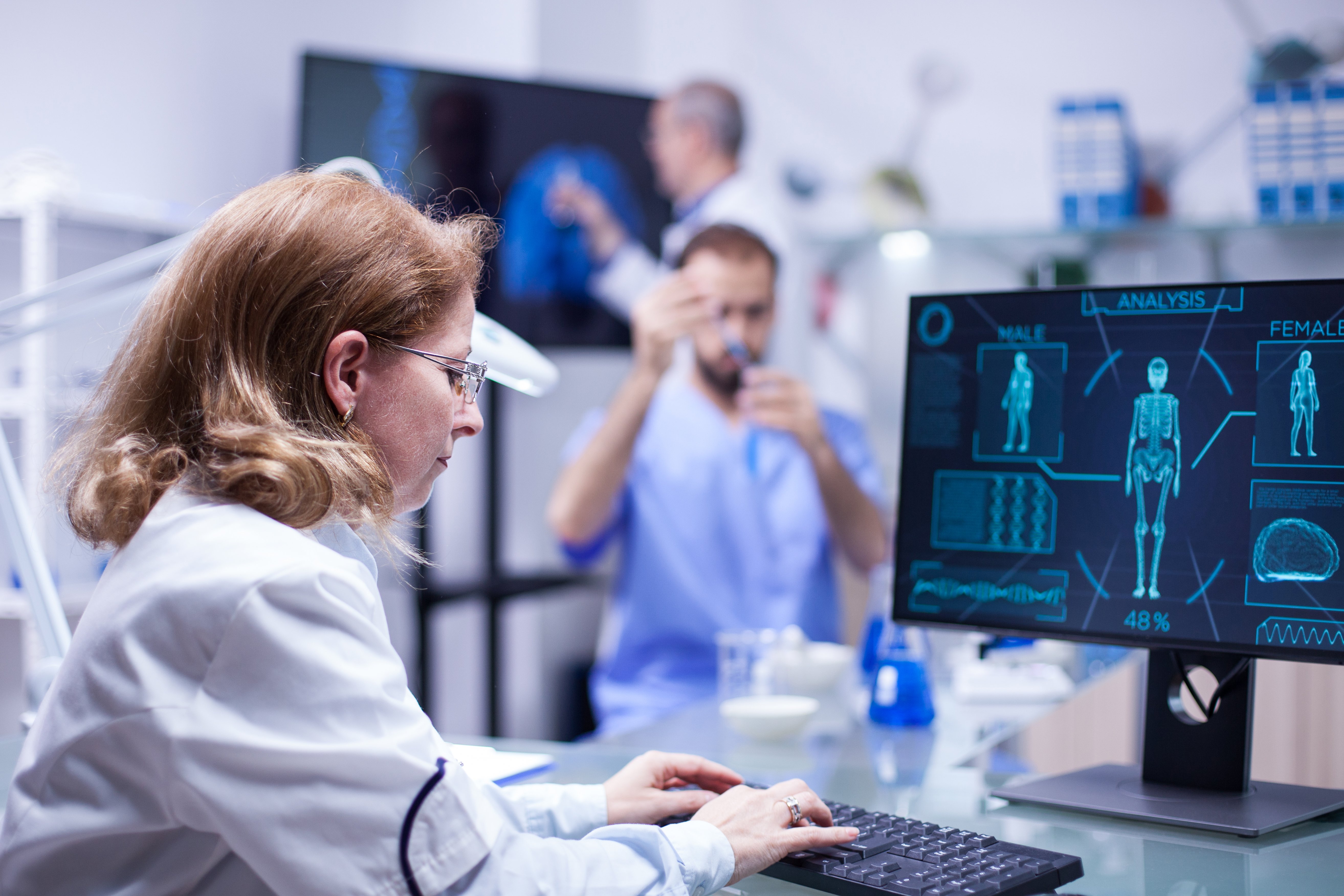 woman-working-with-computer-in-the-office-of-a-sci-ZV4MAXD